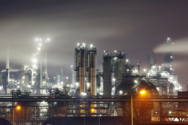 Oil refinery at night - factory, petrochemical industry